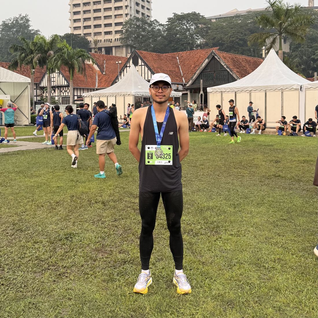 Haziq with his KLSCM finisher medal at Dataran Merdeka